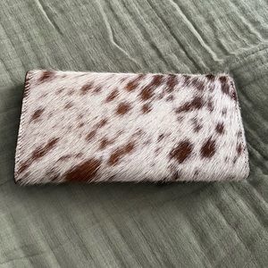 Beautiful leather and cowhide wallet brand new without tags.